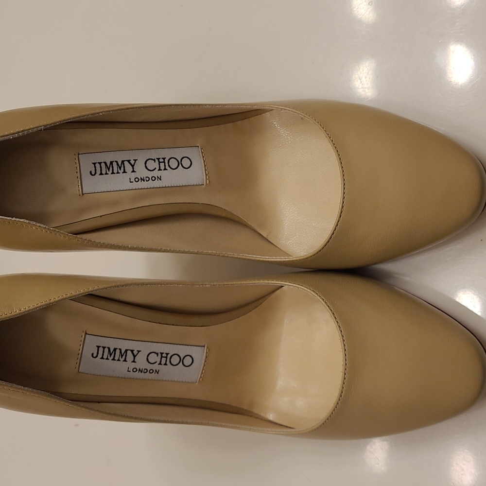 Like new Jimmy Choo tan pump.